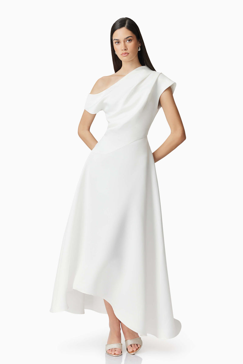 Brunette model wearing Marissa One Shoulder Gown in White posed shot