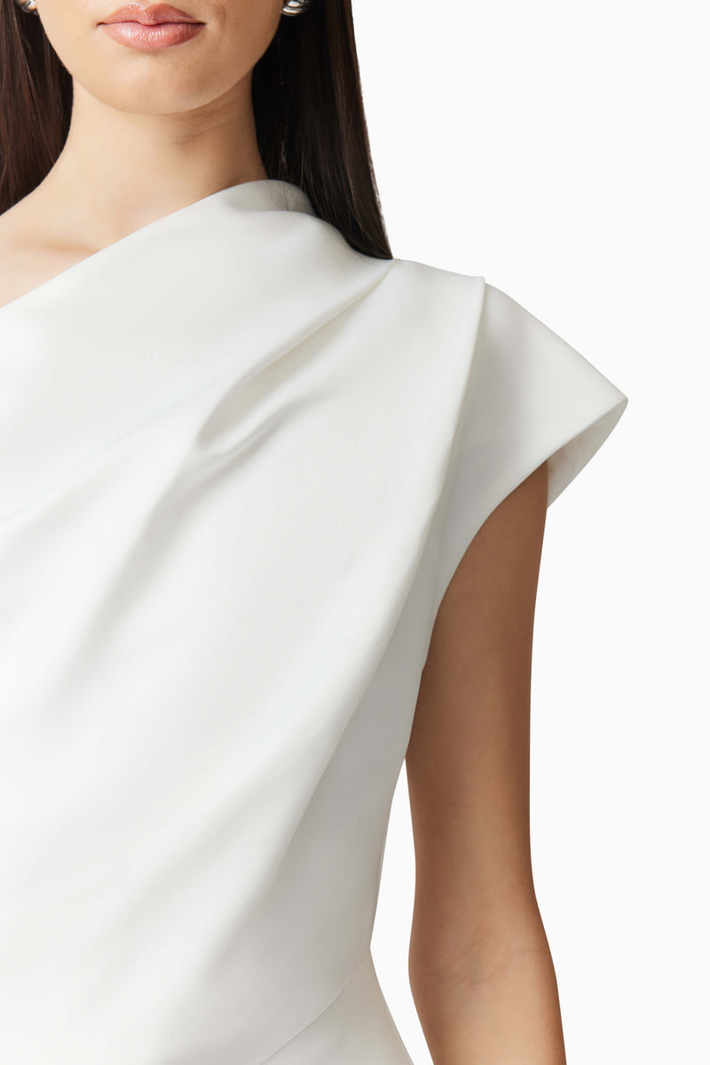 Brunette model wearing Marissa One Shoulder Gown in White detail shot