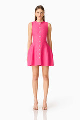 Brunette model wearing the Opline Tuplip Mini Dress in Hot Pink front shot 