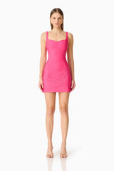 Brunette model wearing the Opline Fitted Mini Dress in Hot Pink front shot 
