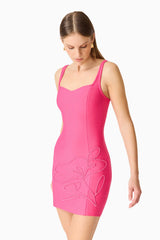 Brunette model wearing the Opline Fitted Mini Dress in Hot Pink close up side shot 
