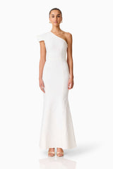 Brunette model wearing the Opline One Shoulder Gown in White front shot 