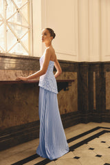Brunette model wearing the Lacy strapless gown in powder blue campaign shot