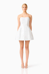 Blonde model wearing the Floralie Strapless Mini Dress in Silver front shot