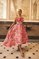 Brunette model wearing the  Floralie Strapless Gown in Pink Floral campaign shot 