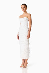 Brunette model wearing the Lucine Strapless Gown Dress in White side shot 