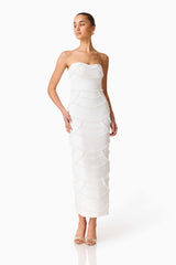 Brunette model wearing the Lucine Strapless Gown Dress in White posed shot 