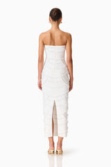 Brunette model wearing the Lucine Strapless Gown Dress in White back shot 