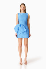 Brunette model wearing the Briallen Jacquard Mini Dress in Blue Front Shot
