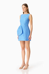 Brunette model wearing the Briallen Jacquard Mini Dress in Blue Side Shot