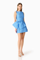 Brunette model wearing the Briallen Jacquard Mini Dress in Blue Posed Shot