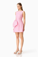 Brunette model wearing the Briallen Jacquard Mini Dress in Pink Side Shot