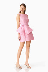 Brunette model wearing the Briallen Jacquard Mini Dress in Pink Posed looking away Shot