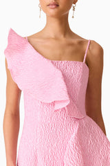 Brunette model wearing the Briallen Jacquard Midi Dress in Pink Detail Shot