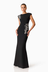 Brunette model wearing the Veda Embellished Gown in Black Posed Shot
