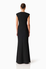 Brunette model wearing the Veda Embellished Gown in Black Back Shot