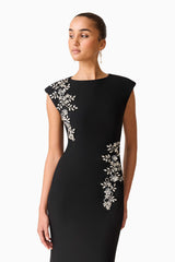 Brunette model wearing the Veda Embellished Gown in Black Close Up Shot
