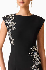 Brunette model wearing the Veda Embellished Gown in Black Detail Shot