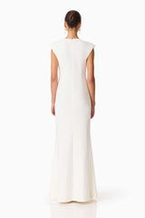 Brunette model wearing the Veda Embellished Gown in White Back Shot