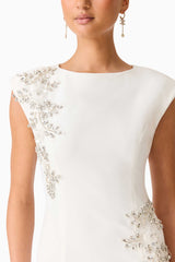 Brunette model wearing the Veda Embellished Gown in White Detail Shot