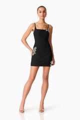 Brunette model wearing the Veda Embellished Mini Dress in Black Posed Shot
