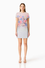 Brunette model wearing the Lurea Short Sleeve Mini Dress in Pink Floral Front Shot