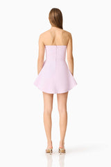 Brunette model wearing the Saphine Frill Mini Dress in Pink Back Shot