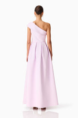 Brunette model wearing the Saphine One Shoulder Gown in Pink Back Shot