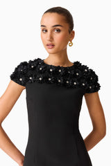 Brunette model wearing the Dali Floral Applique Mini Dress in Black Close Up Shot