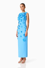 Brunette model wearing the Dali Floral Applique Gown in Blue Side Shot
