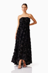 Brunette model wearing Selena Strapless Maxi Dress in Black posed shot