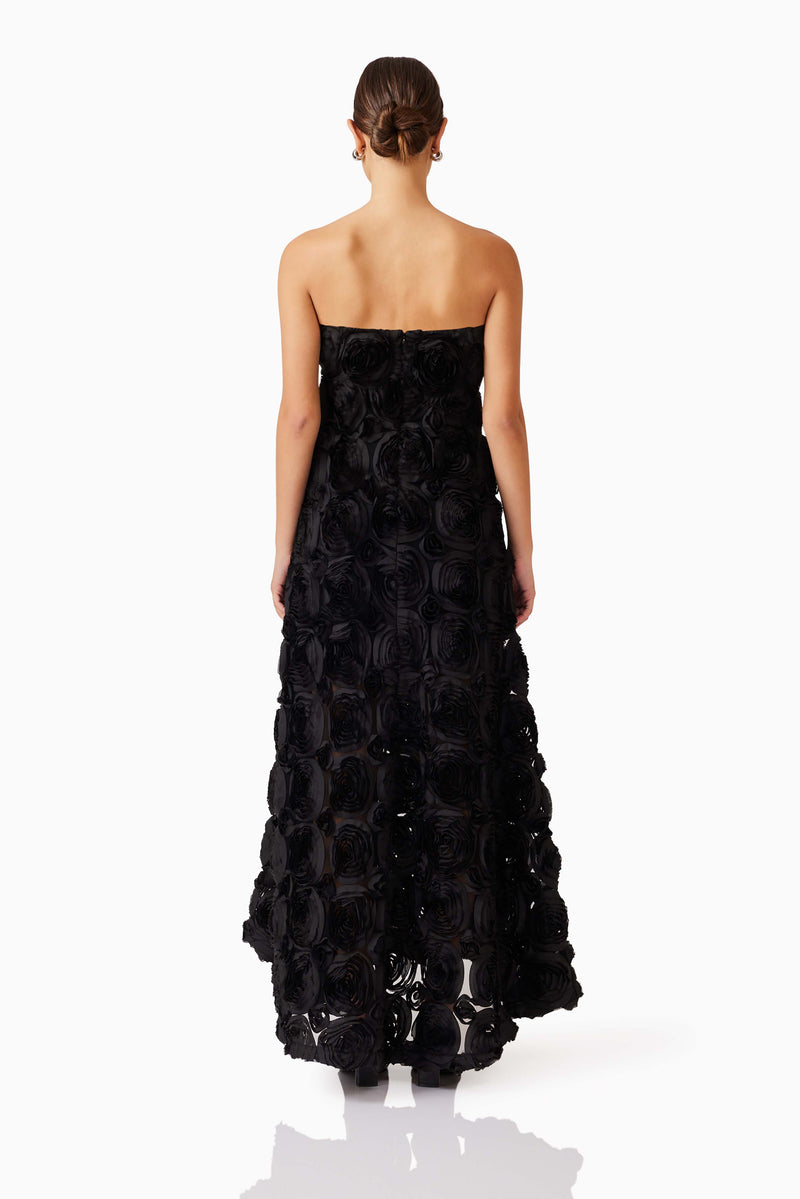 Brunette model wearing Selena Strapless Maxi Dress in Black back shot