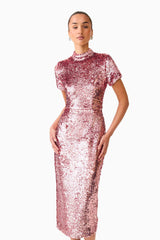 Brunette model wearing the Alissa Sequin Midi Dress in Pink close up posed shot 