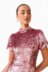 Brunette model wearing the Alissa Sequin Midi Dress in Pink close up shot 
