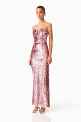 Brunette model wearing the Alissa Sequin Strapless Gown in Pink side shot 