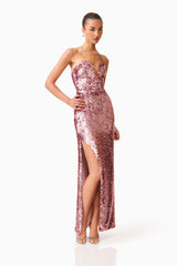 Brunette model wearing the Alissa Sequin Strapless Gown in Pink posed side shot 