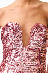 Brunette model wearing the Alissa Sequin Strapless Gown in Pink detail shot 