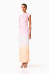 Brunette model wearing the Lumira Sequin Lace Gown in Pink Ombre side shot 