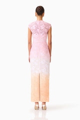 Brunette model wearing the Lumira Sequin Lace Gown in Pink Ombre back shot 