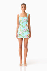 Brunette model wearing the Emmeline Sequin Mini Dress in Mint Green front shot 