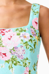 Brunette model wearing the Emmeline Sequin Midi Dress in Mint Green detail shot 