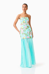 Brunette model wearing the Emmeline Sequin Gown in Mint Green posed side shot 