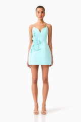 Brunette model wearing the Stella Tulip Mini Dress in Aqua Blue front shot 