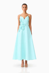 Brunette model wearing the Stella A-Line Gown in Aqua Blue front shot 