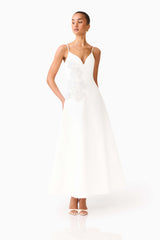 Brunette model wearing the Stella A-Line Gown in White posed side shot 