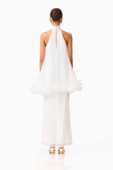 Brunette model wearing the Poppy Cape Gown in White back shot 