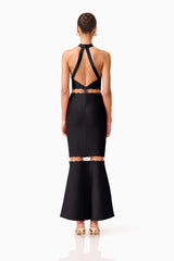 Brunette model wearing the Naomi Halter Gown in Black back shot 