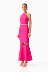 Brunette model wearing the Naomi Halter Gown in Raspberry Pink side shot 