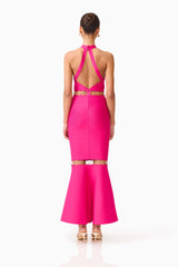 Brunette model wearing the Naomi Halter Gown in Raspberry Pink back shot 