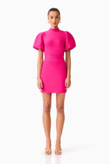 Brunette model wearing the Naomi Puff Sleeve Mini Dress in Raspberry Pink front shot 